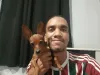 Adoção de cachorro: Baphomet e Newton Vianna não se desgrudam por nada
